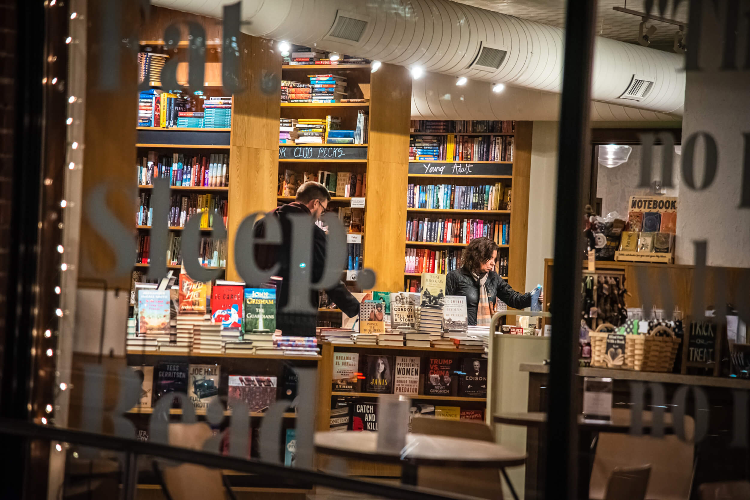 People shop at a bookstore in the Tulsa Arts District .
