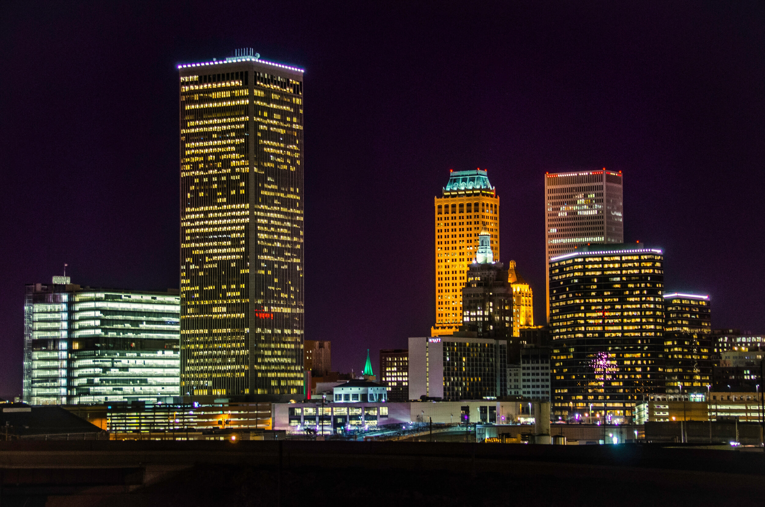 nighttime skyline of Tulsa, OK.